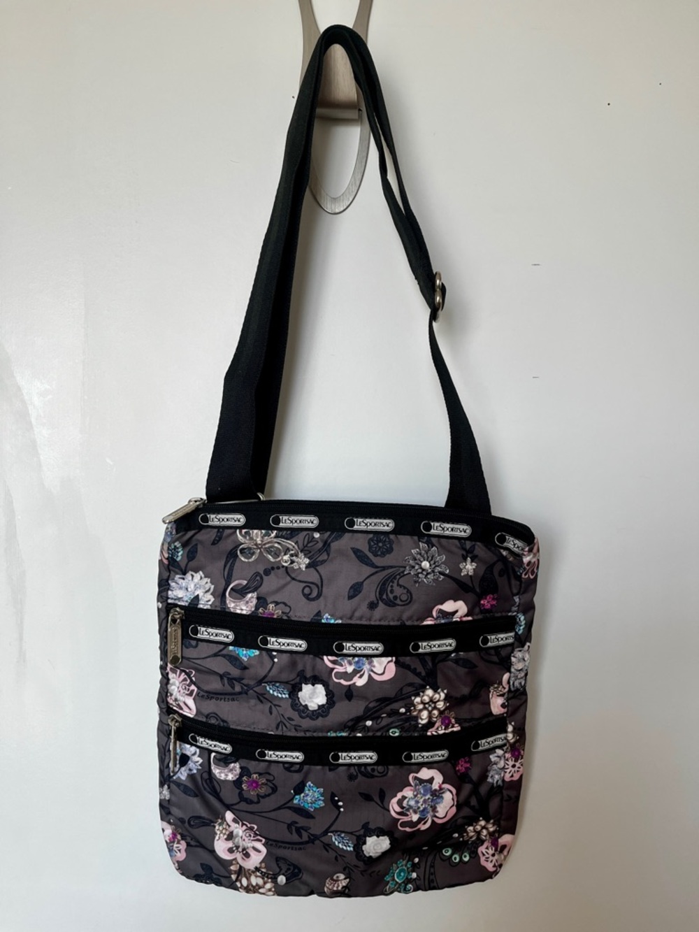 Lesportsac Black Floral Crossbody Bag with Pink and Blue Accents